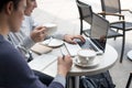 Two young businessman having a successful meeting at restaurant. Royalty Free Stock Photo