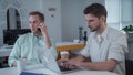 Two young businessman working at the modern office. Royalty Free Stock Photo