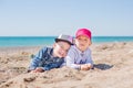 Two Young Children Playing in the Sand Royalty Free Stock Photo