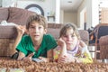 Two young children watching tv Royalty Free Stock Photo