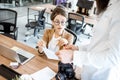 Two young colleagues working in the office Royalty Free Stock Photo