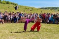 Two young cossacks fighting during the ethno-rock festival Kozak Fest