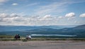 Two young couples enjoying a view of loch morlich and Glenmore Forest Park from a high point Royalty Free Stock Photo