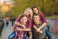 Two young couples spend time in the Park