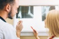 Two young doctors looking at x-ray healthcare, medical and radiology concept Royalty Free Stock Photo