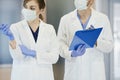 Two doctors in protective masks Royalty Free Stock Photo
