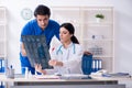 The two young doctors working in the clinic Royalty Free Stock Photo