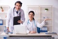 The two young doctors working in the clinic Royalty Free Stock Photo
