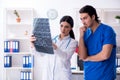The two young doctors working in the clinic Royalty Free Stock Photo