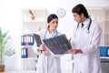 The two young doctors working in the clinic Royalty Free Stock Photo