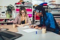 Young entrepreneur women, or fashion designers working in atelier