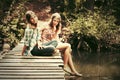 Two young fashion teen girls in a summer forest Royalty Free Stock Photo