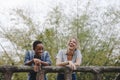 Two young female adult friends outdoors friendship bonding, freedom and outdoor concept Royalty Free Stock Photo