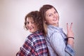 Two young girl friends having fun and smiling