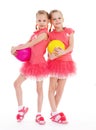 Two young girl gymnast with sports balls. Royalty Free Stock Photo