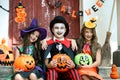 Young girls and boy in halloween costumes Royalty Free Stock Photo