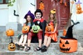 Young girls and boy in halloween costumes Royalty Free Stock Photo