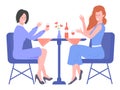 Two young girls drink wine in a restaurant.