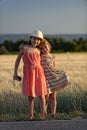 Two young girls in field Royalty Free Stock Photo