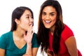 Two young girls gossiping Royalty Free Stock Photo