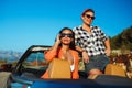 Two young girls having fun in the cabriolet outdoors Royalty Free Stock Photo