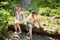 Two young girls hiking in Strazyska Valley in Tatra Mountain range, Podhale, Poland