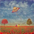 Two young girls with the kite on the field of poppies Royalty Free Stock Photo