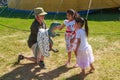 A man with a dinosaur hand puppet at a dinosaur show