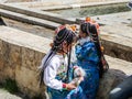 Two young girls of the Naxi minority in Zhongdian old town