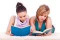 Two young girls reading books Royalty Free Stock Photo