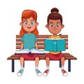 Two young girls reading books Royalty Free Stock Photo