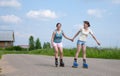 Two Young girls on roller blades Royalty Free Stock Photo