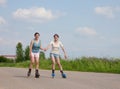 Two Young girls on roller blades Royalty Free Stock Photo