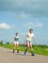 Two Young girls on roller blades Royalty Free Stock Photo