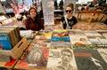 Two young girls sell vintage vinyl records