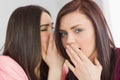 Two young girls sharing secrets Royalty Free Stock Photo