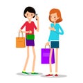 Two young girls with shopping bags. One girl with packages in bo Royalty Free Stock Photo