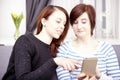 Two young girls with smart phone Royalty Free Stock Photo