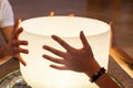 Couple holding a crystal bowl together Royalty Free Stock Photo