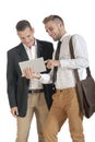 Two young handsome businessmen working with digital tablet Royalty Free Stock Photo