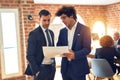 Two young handsome businessmen working together Royalty Free Stock Photo