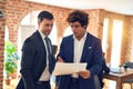 Two young handsome businessmen working together Royalty Free Stock Photo