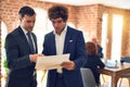 Two young handsome businessmen working together Royalty Free Stock Photo