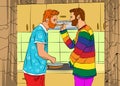 Two young handsome gay couple cook at home in the kitchen. Royalty Free Stock Photo