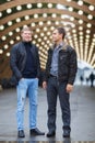 Two young handsome man in black jacket posing on Royalty Free Stock Photo