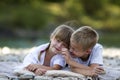 Two young happy cute blond smiling children, boy and girl, broth Royalty Free Stock Photo