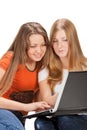 Two young happy student girl work on laptop Royalty Free Stock Photo