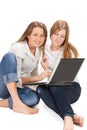 Two young happy student girl work on laptop Royalty Free Stock Photo