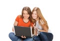 Two young happy student girl work on laptop Royalty Free Stock Photo