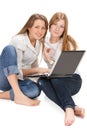 Two young happy student girl work on laptop Royalty Free Stock Photo